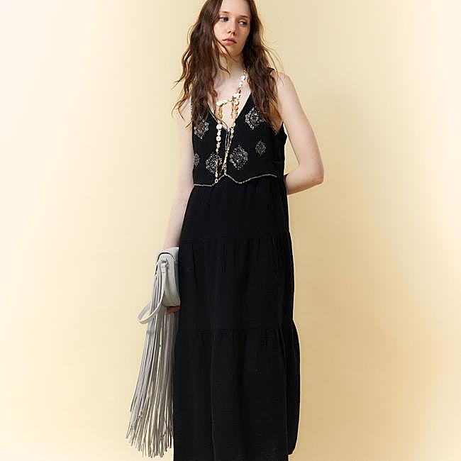 Vestido con chaleco de brillos