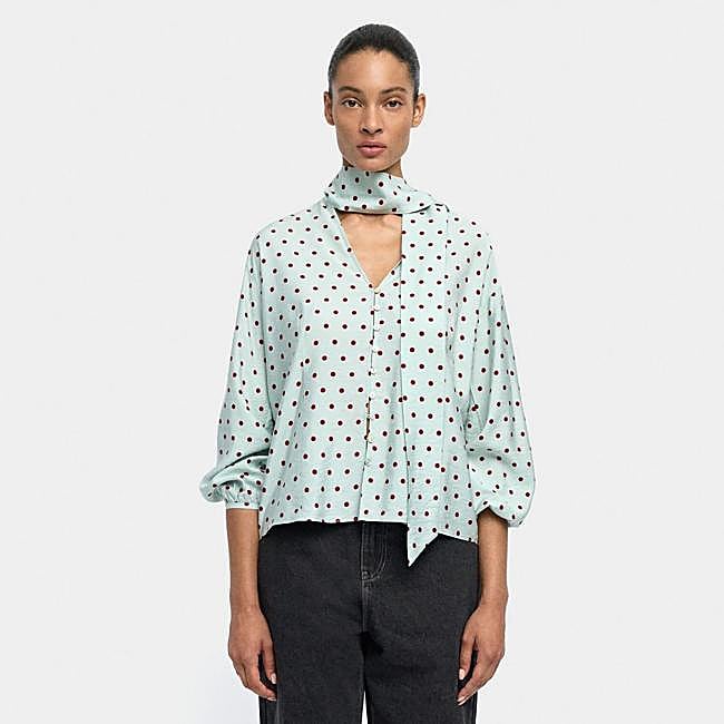 Blusa estampada con lazo en el cuello
