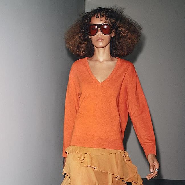 Jersey de punto fino con escote de pico