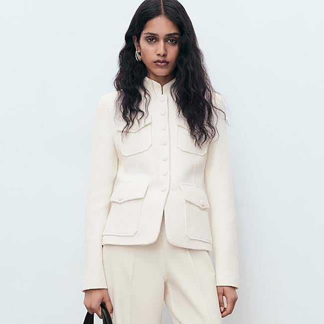 Chaqueta blanca Boucle de Mango, 79,99 euros.