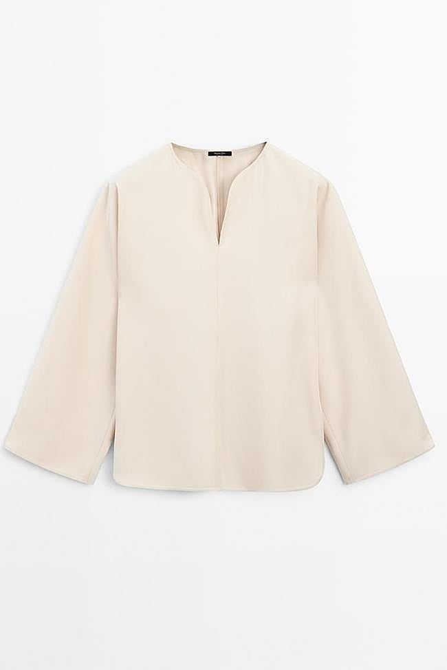 Blusa fluida detalle aberturas (69,95€)