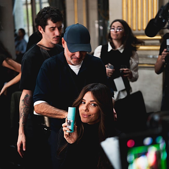 Stéphane Lancien con Eva Longoria en el backstage de Le Défilé.