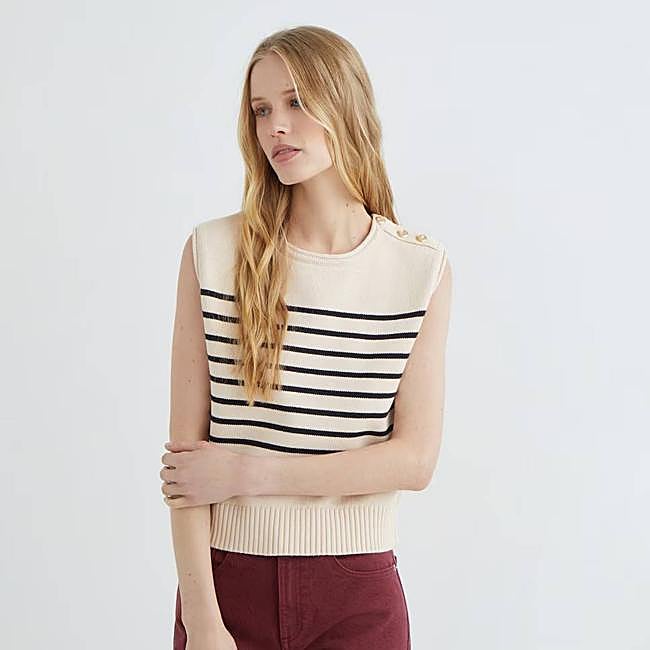 Chaleco de mujer de punto y cuello caja (19€)