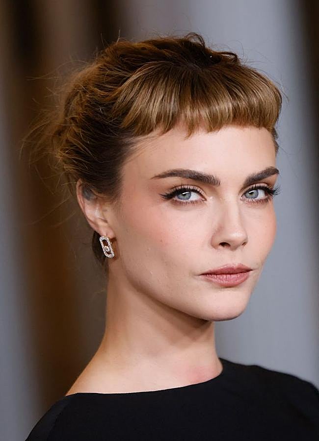 Imagen - Cara Delevigne con flequillo micro bangs tendencia para 2025/@daniellepriano