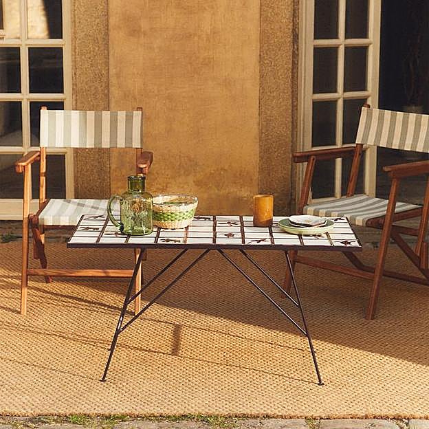 Mesa exterior con mosaico rebajada a 299 eruos en Zara Home.