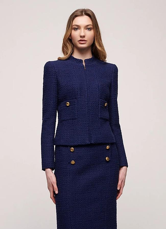 Imagen - Traje de falda midi azul marino de Luisa Spagnoli, a la venta en Zalando: falda 234 euros y chaqueta 429 euros.