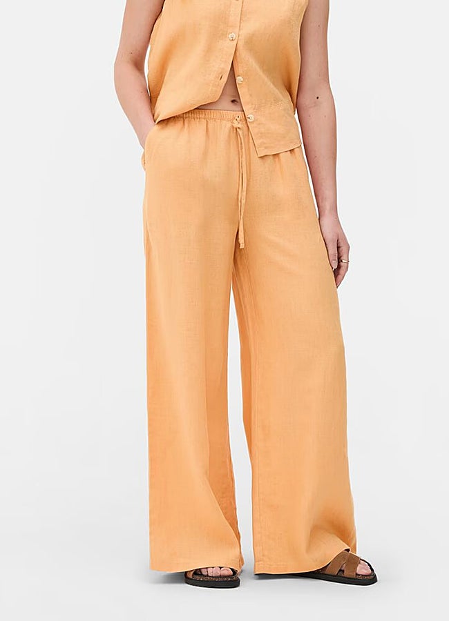 Imagen - Pantalón de lino naranja de Primark.
