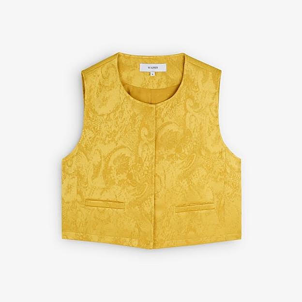 Chaleco de mujer corte cropped con botones ocultos (59,90€ en El Corte Inglés)