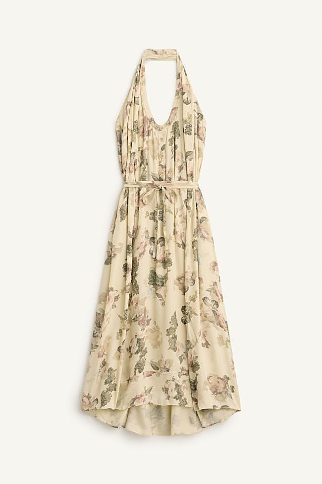 Vestido midi con cuello halter y estampado de flores de la colección SRPLS FLWRS de Zara.