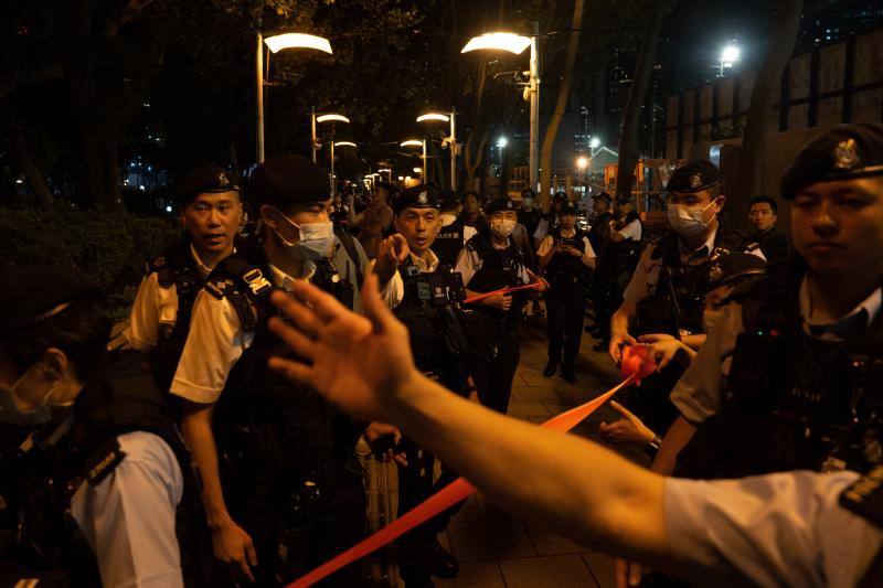 The Police were sweeping the streets to prevent anyone from holding candles