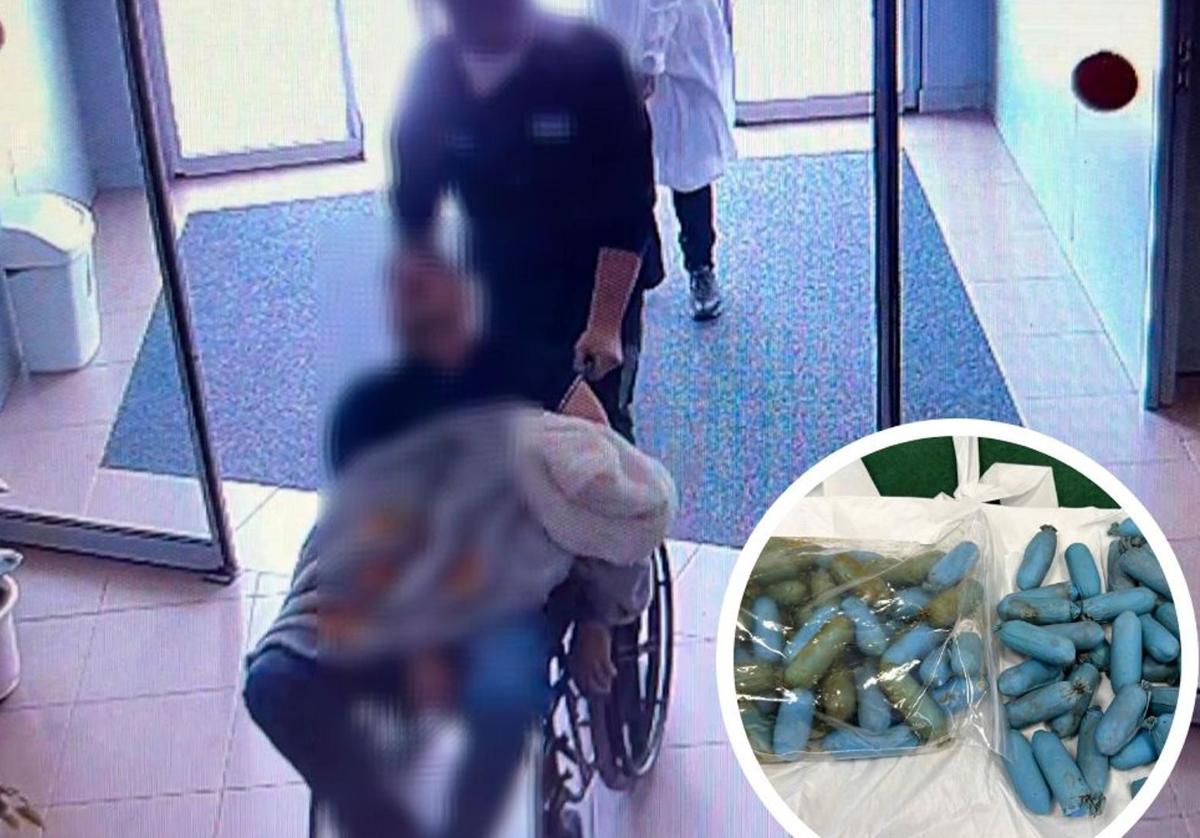 Uno de los dos detenidos, con el fallecido en silla de ruedas, en la entrada del centro de salud.