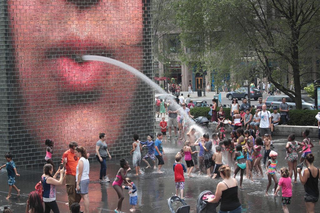 A unique fountain in Chicago allows citizens to cool off.