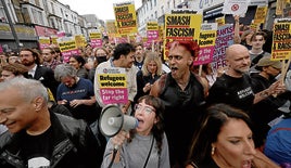 Manifestantes en una concentración contra el racismo.
