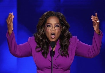 La reina de la televisión Oprah Winfrey y un bromista Bill Clinton apoderan a un emocionado Tim Walz