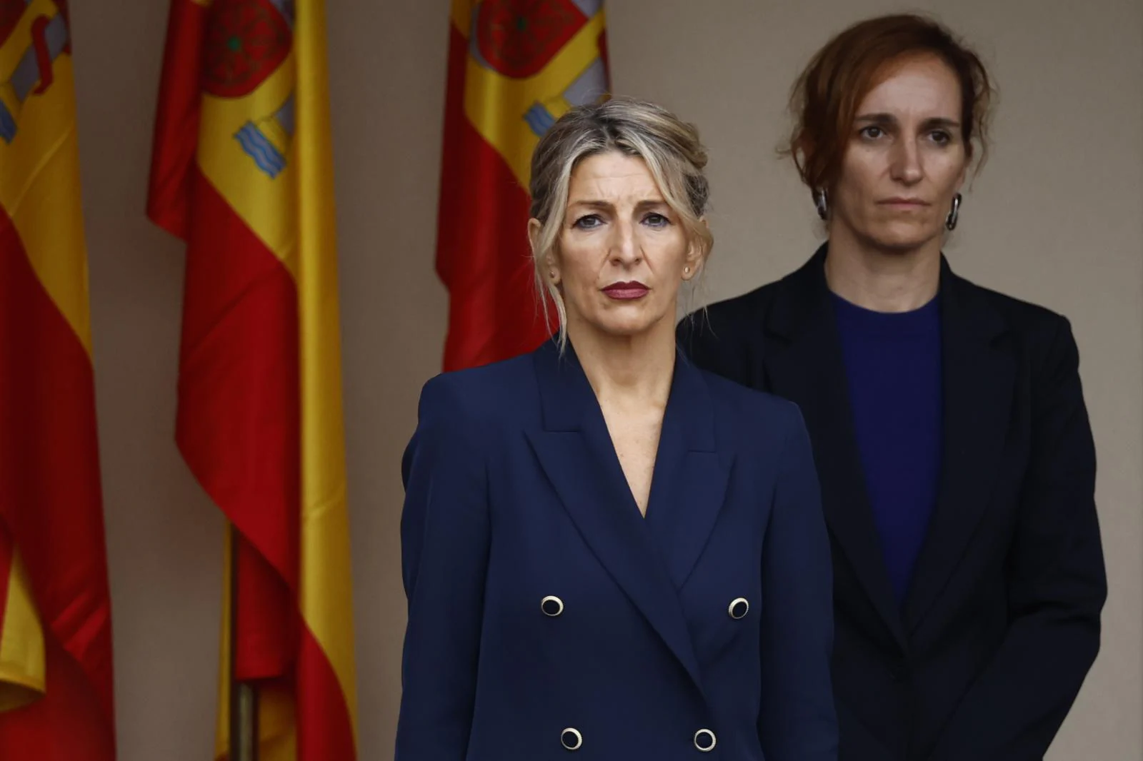 Las ministras de Sanidad, Mónica García y de Trabajo, Yolanda Díaz a su llegada este sábado al tradicional desfile del Día de la Fiesta Nacional.