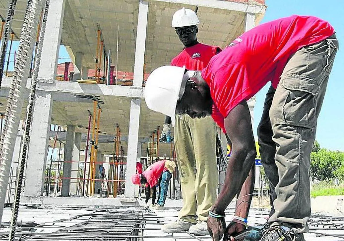 Trabajadores, en una obra.