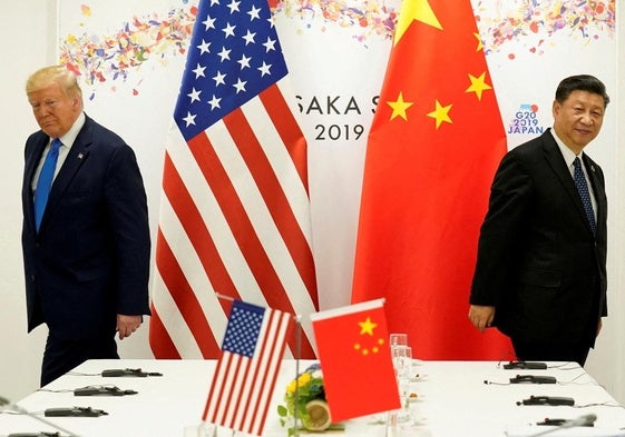 Donald Trump y Xi Jinping, cada uno por su lado.