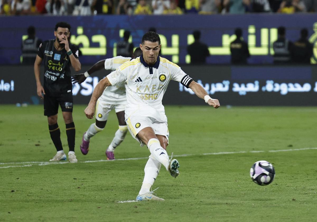 Cristiano Ronaldo takes a penalty.