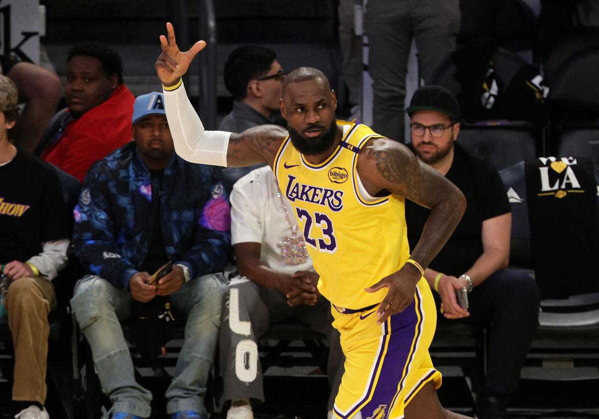LeBron James celebrates a basket.