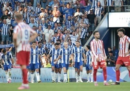 Jugadores del Atlético decepcionados contra el Oporto