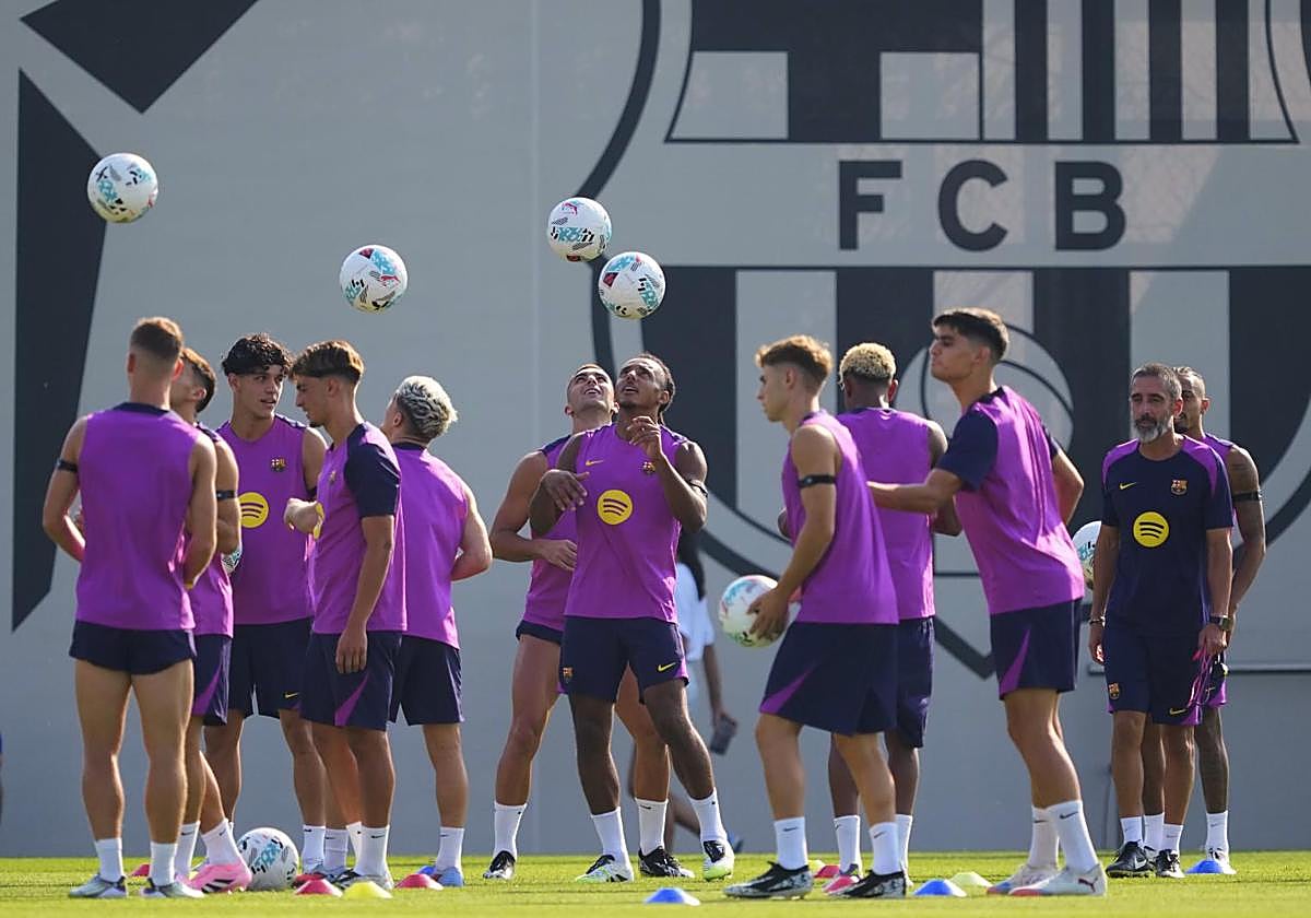 Los jugadores del Barça, durante un entrenamiento.