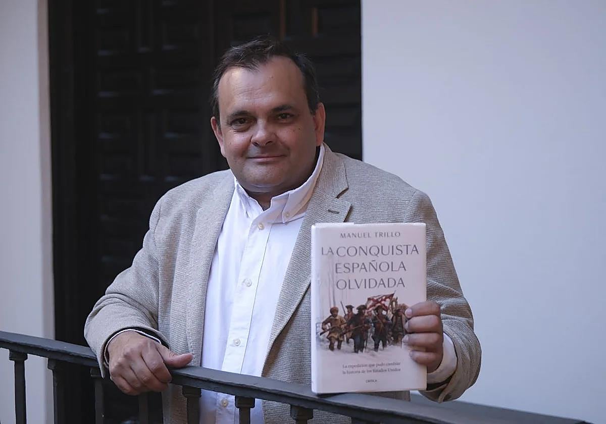 Manuel Trillo with his latest book, 'The Forgotten Spanish Conquest'.