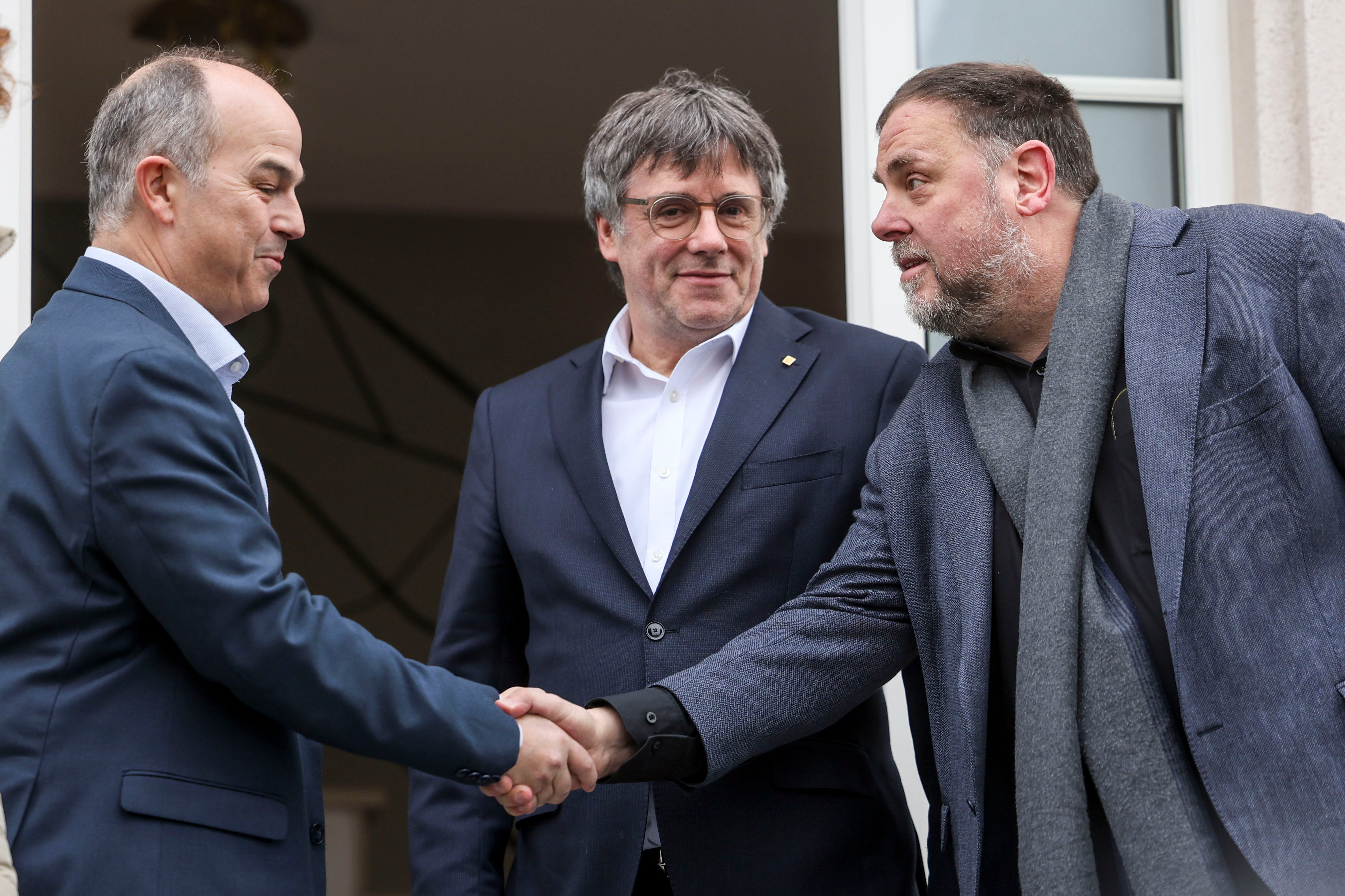 Jordi Turull, Charles Puigdemont y Oriol Junqueras en Waterloo.
