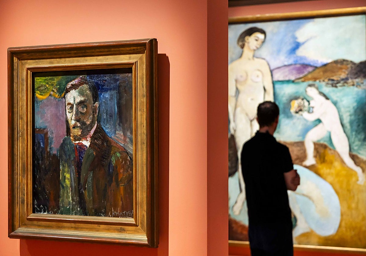 A spectator observes works by Henri Matisse at CaixaForum Madrid.