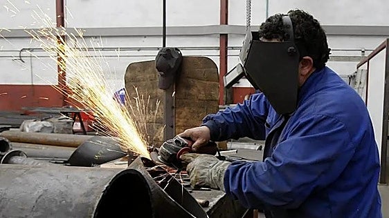 La economía española creció dos décimas menos el año pasado, el 2,6%