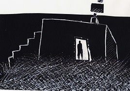 Hombre en el umbral de una vivienda.