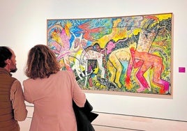 Besucher vor dem Werk 'Mapa de Carne' von Miquel Barceló.