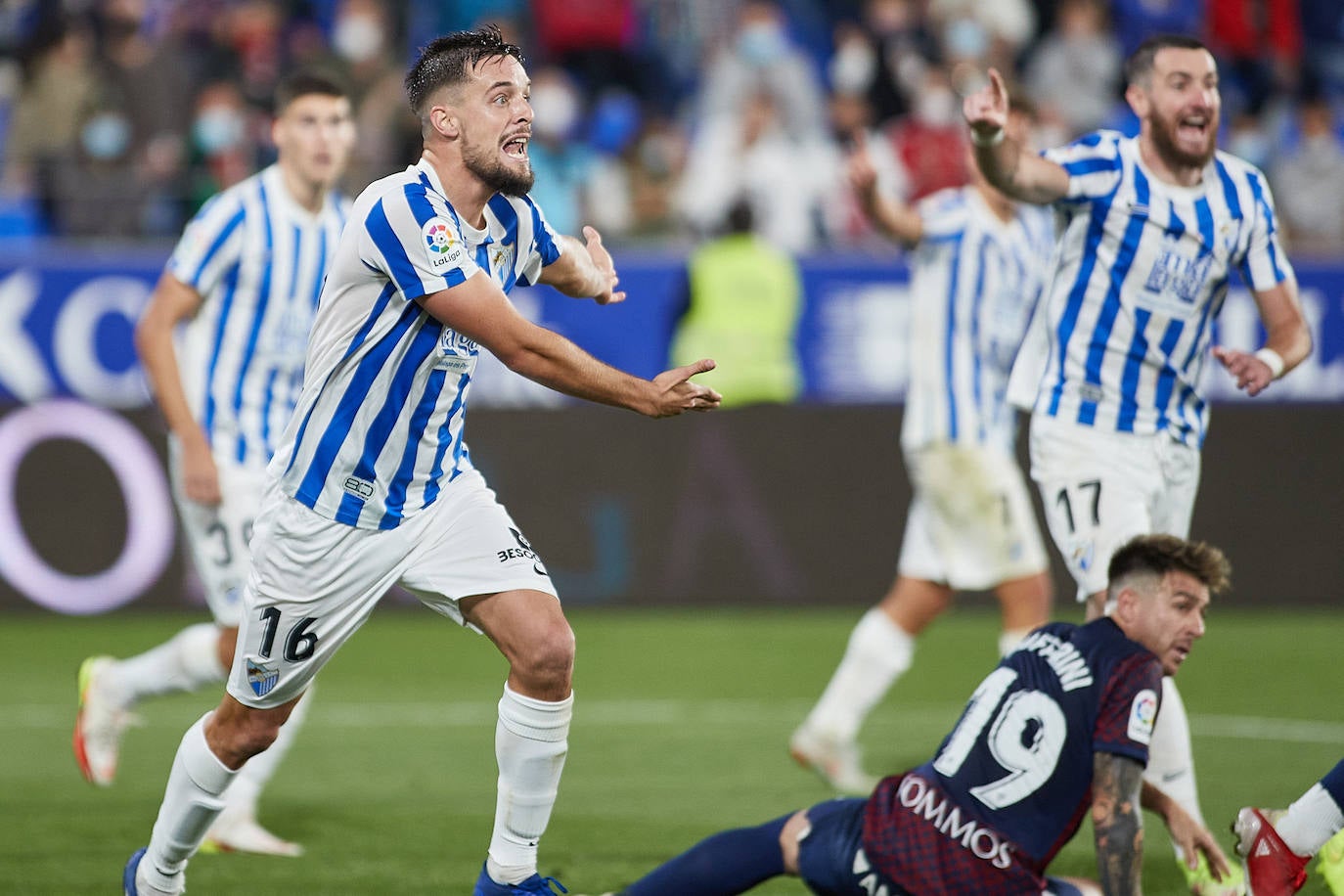 Malaga brought a point home from the El Alcoraz stadium.