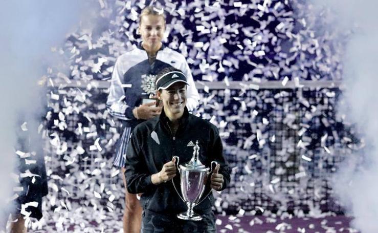 Muguruza celebrates winning the WTA tournament in Mexico