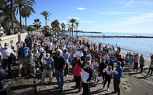 Protesters on the beach on Sunday.