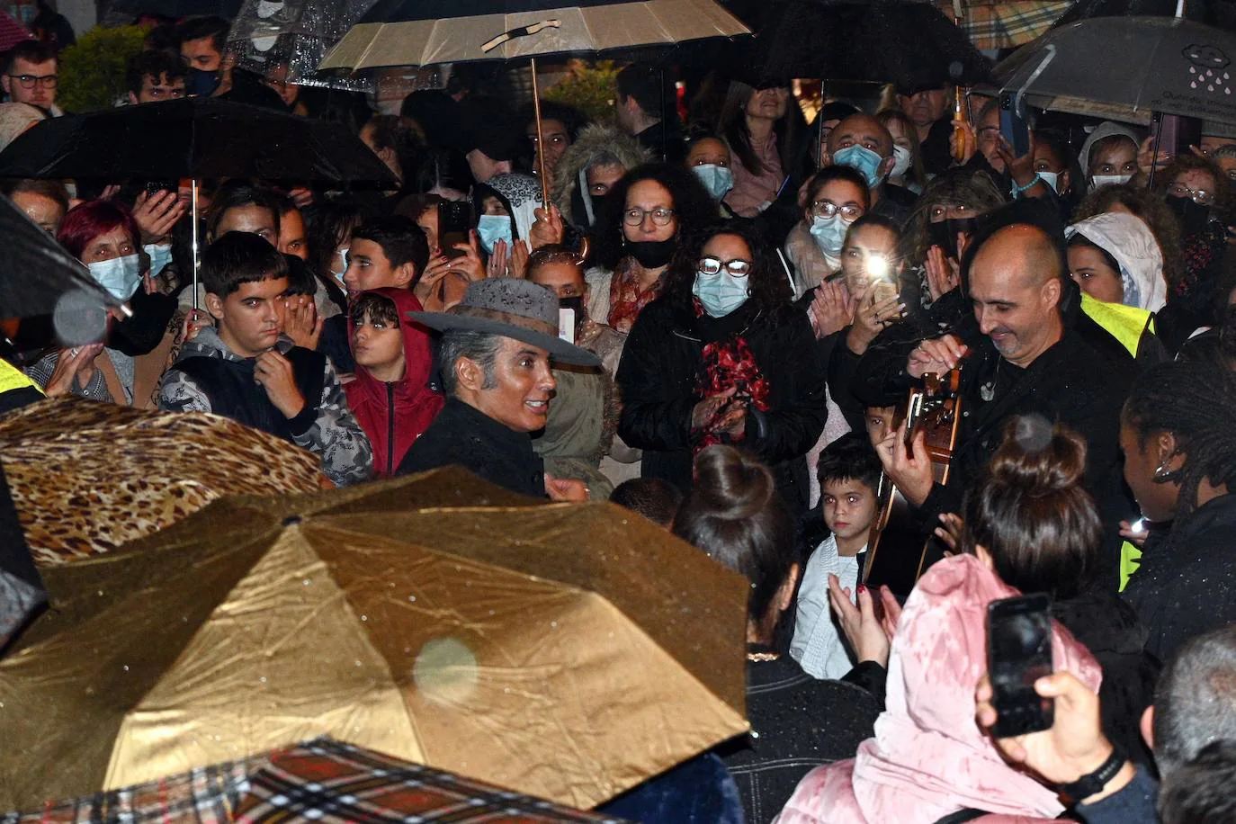 Crowds gathered at Marbella's Christmas lights despite the threat of rain.