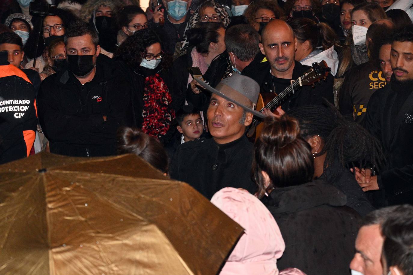 Crowds gathered at Marbella's Christmas lights despite the threat of rain.