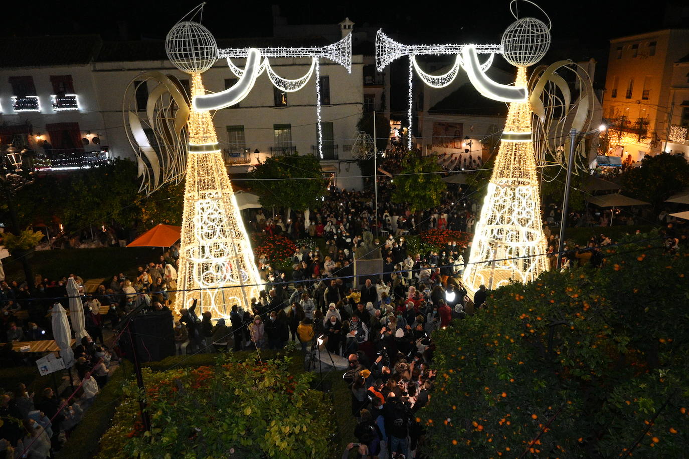 Crowds gathered at Marbella's Christmas lights despite the threat of rain.