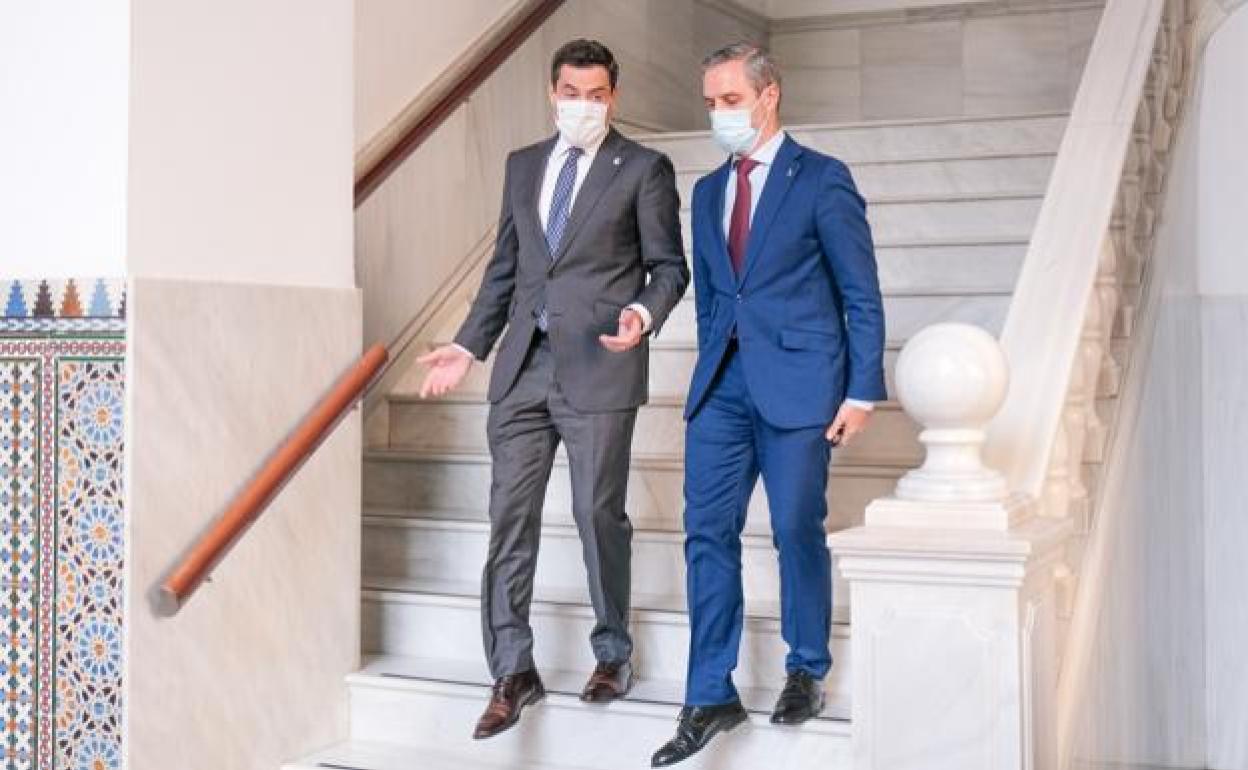 President Juanma Moreno and regional Treasury minister, Juan Bravo.