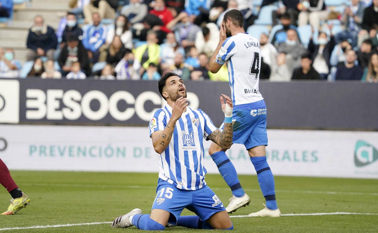 Antoñín looks to up in disbelief after missing an chance. 