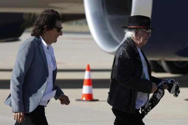 Mick Jagger, Keith Richards and Ronnie Wood, after landing in Madrid on Thursday.