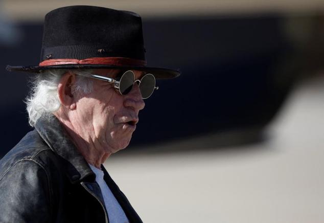 Mick Jagger, Keith Richards and Ronnie Wood, after landing in Madrid on Thursday.