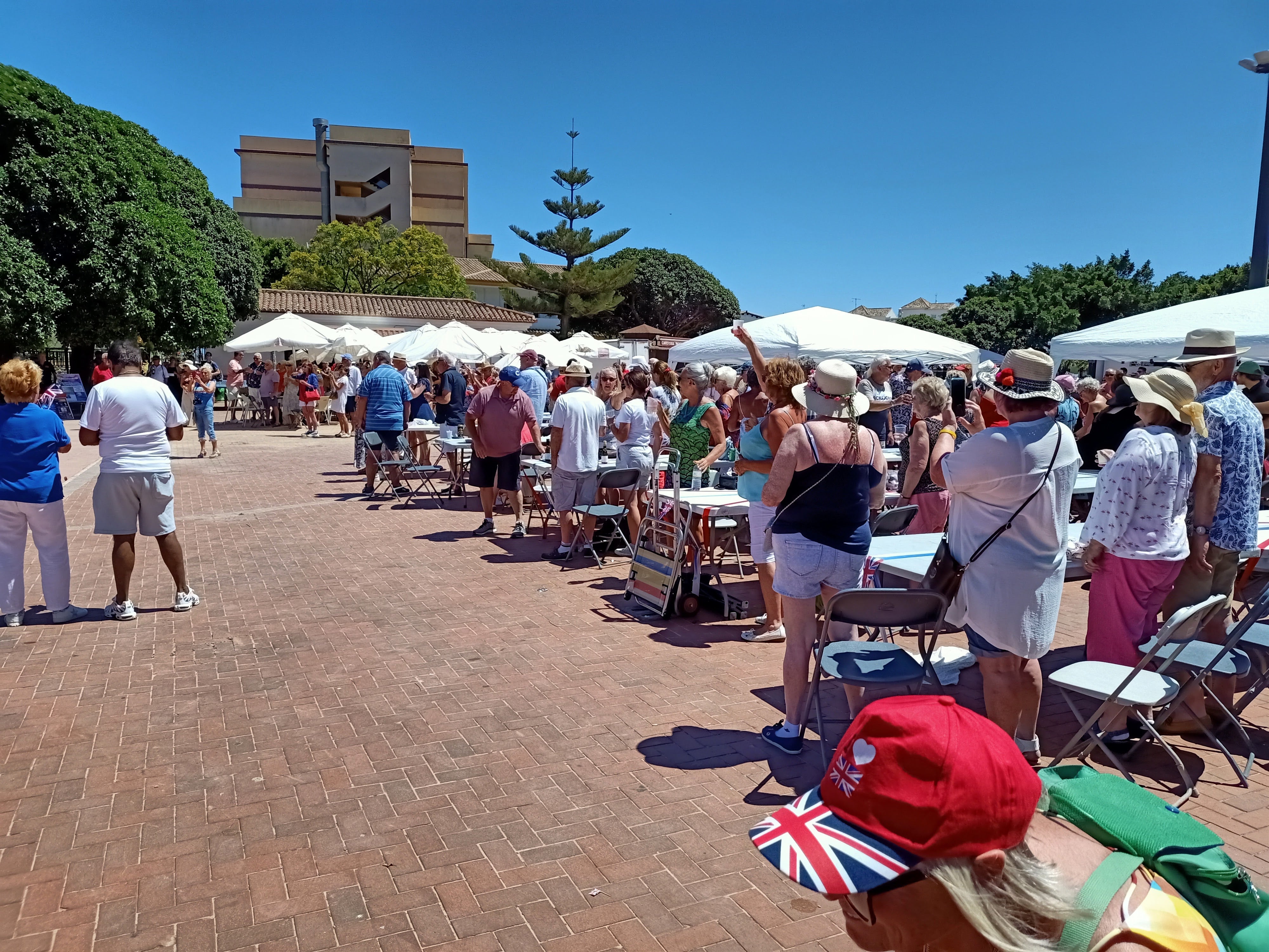 Toasting the Queen. More than 500 hundred people enjoyed the La Cala de Mijas Lions Jubilee Party on Sunday. Many dressed in red, white and blue to celebrate the milestone anniversary. The attendees enjoyed a traditional British street party, while also participating in a massive hokey-cokey performance to get them all in the mood.