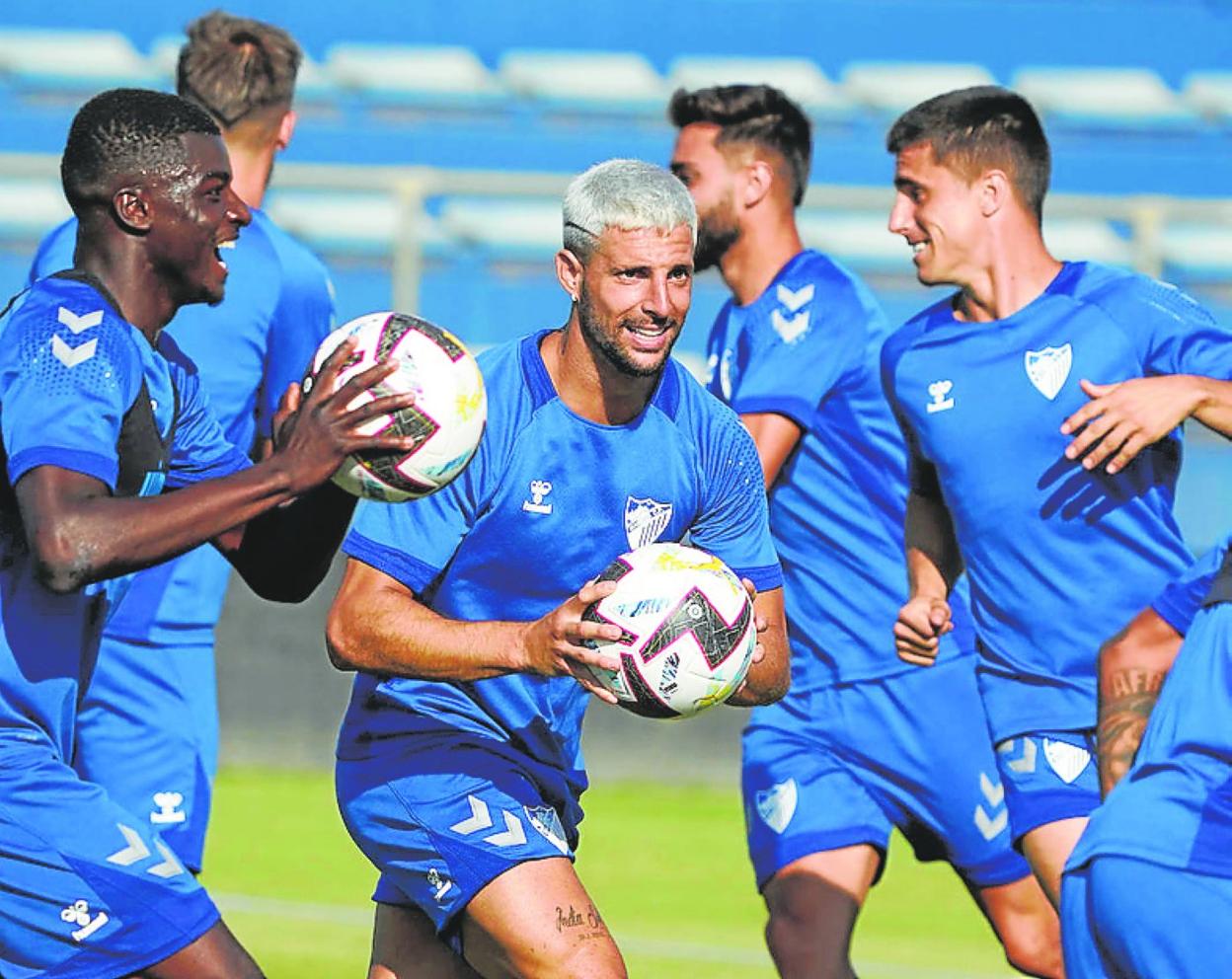 Some of Malaga's summer signings during training last week. 