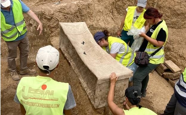 The sarcophagus contained the bodies of a young man and a child. 