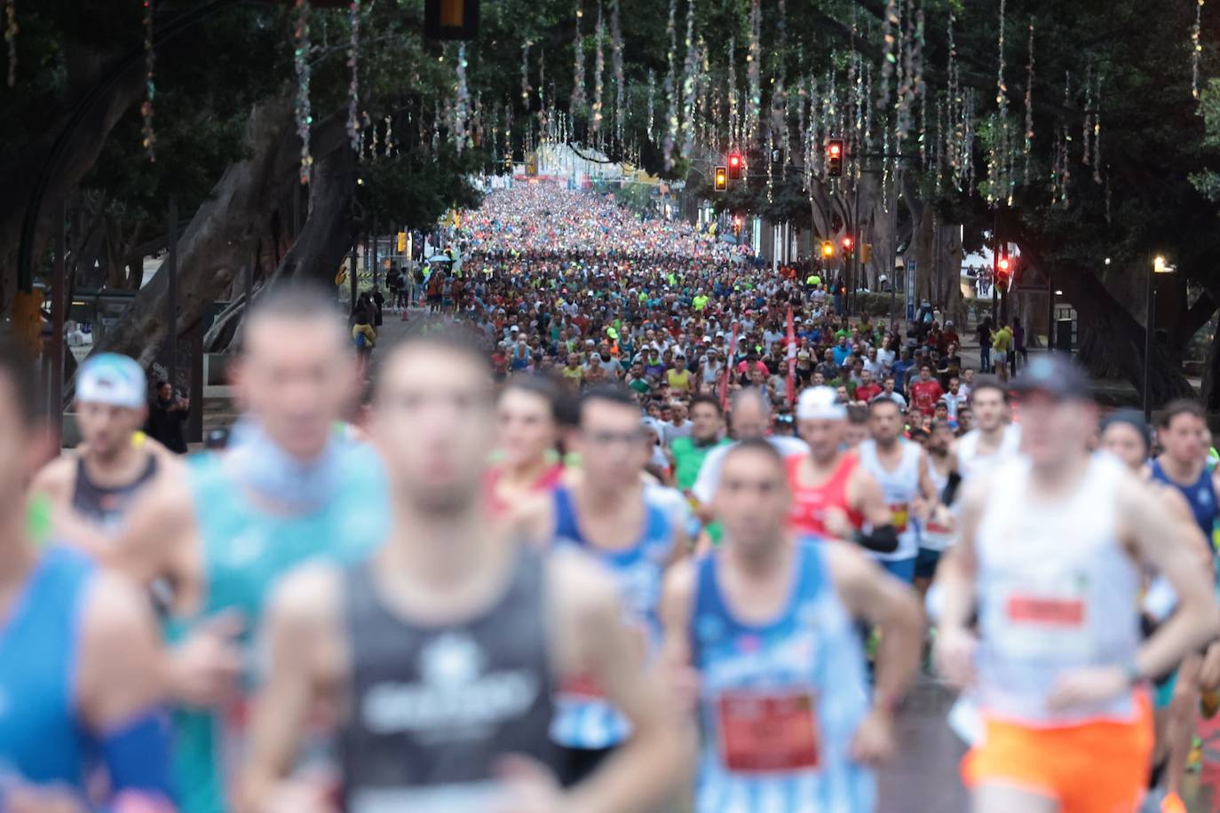 Runners in the Generali Malaga Marathon race on Sunday, 11 December 2022