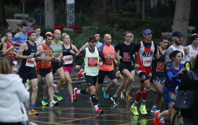 Runners in the Generali Malaga Marathon race on Sunday, 11 December 2022