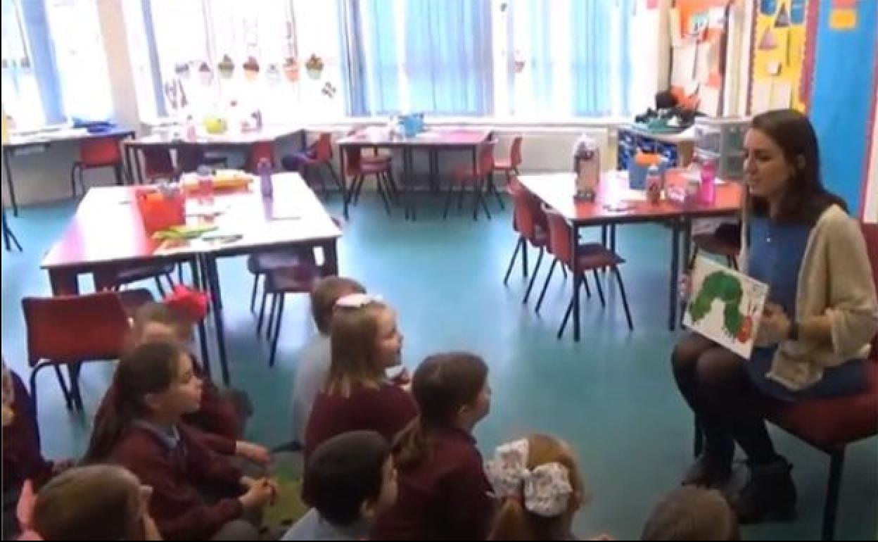 A Spanish conversation assistant, in a class with British children. 