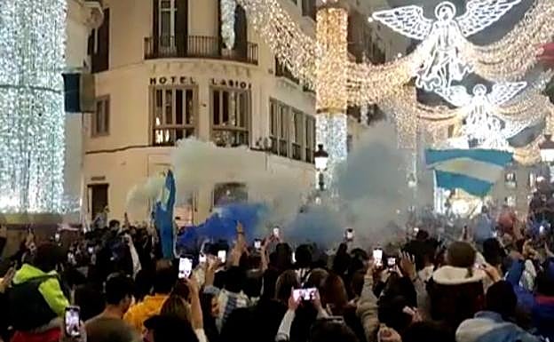 Hundred of happy Malaga fans celebrate the team's win in the Qatar World Cup final