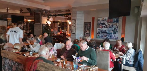 Age Concern members enjoy festive gathering with Christmas carols