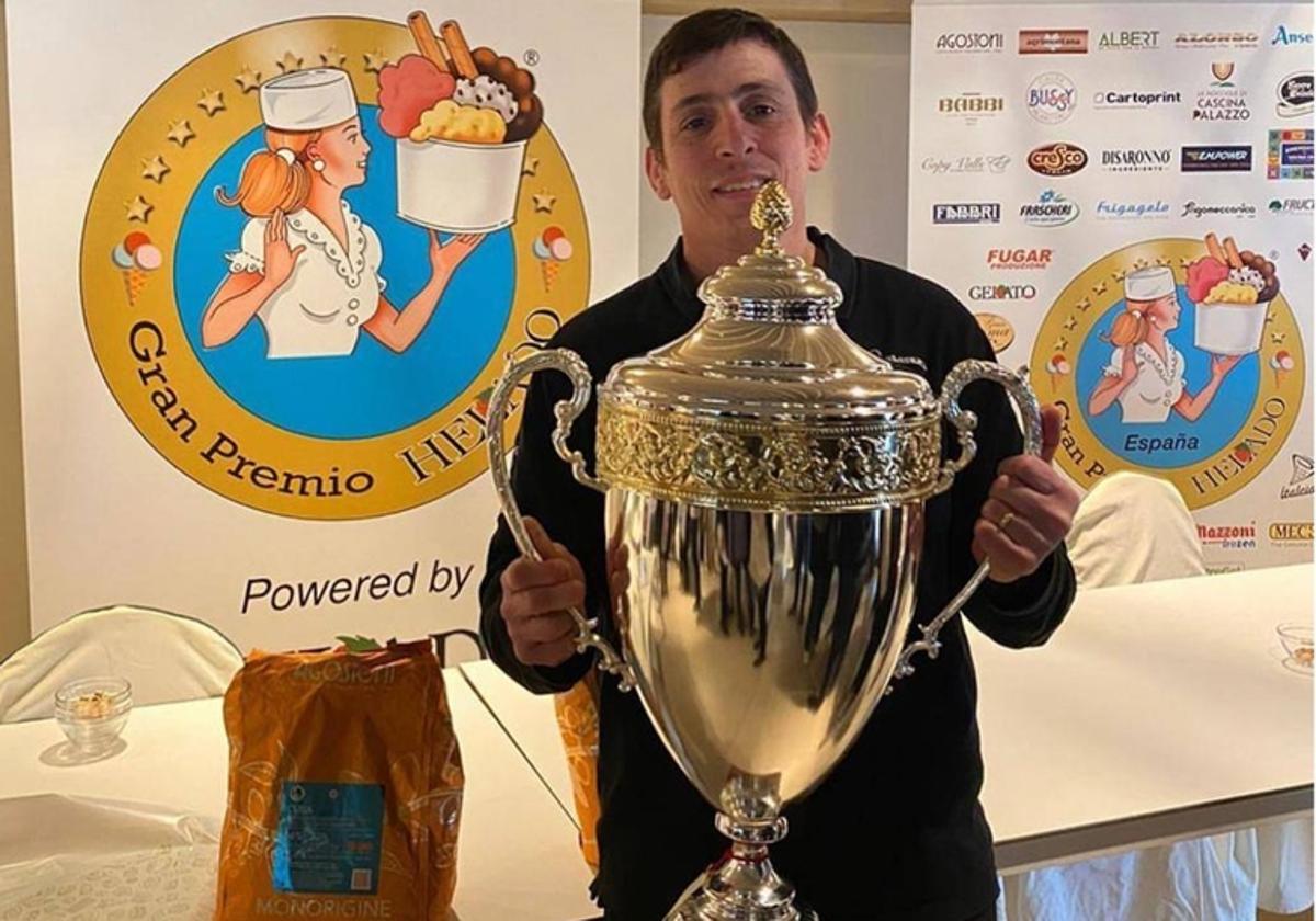 Matias Kuyumdjian poses with the winner's trophy.